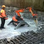 The robot eats concrete with water so the rebar can be re-used!